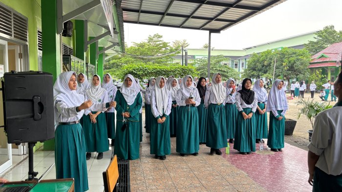 Harmoni di Bawah Langit Gerimis: Suara Pemuda MAN 2 Kota Jambi Bergema untuk Indonesia