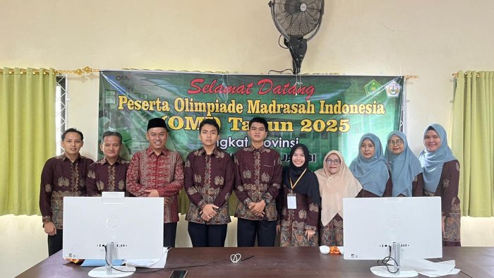 Kepala MAN 2 Kota Jambi Pantau Langsung OMI, Suntik Semangat untuk Tim Madrasah